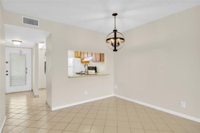 Explore this delightful first-floor unit, boasting two bedrooms on Sunrise Lakes Phase IV Golf Course in Florida - for sale on GolfHomes.com, golf home, golf lot