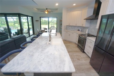 Welcome to Burnt Store Meadows and this amazing 2017 custom on Seminole Lakes Country Club in Florida - for sale on GolfHomes.com, golf home, golf lot