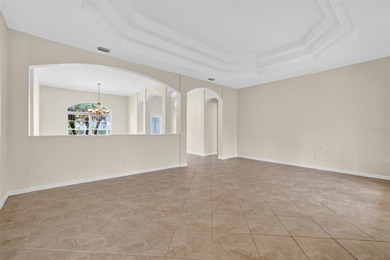 This freshly painted corner lot home offers one of the larger on Ocala Palms Golf and Country Club in Florida - for sale on GolfHomes.com, golf home, golf lot