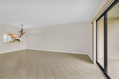 Explore this delightful first-floor unit, boasting two bedrooms on Sunrise Lakes Phase IV Golf Course in Florida - for sale on GolfHomes.com, golf home, golf lot
