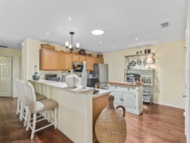 Located in The Village of Ashland! TURNKEY Exceptional 2/2 on The Links of Spruce Creek in Florida - for sale on GolfHomes.com, golf home, golf lot