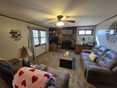 This beautifully updated 2-bedroom, 1.5-bathroom home boasts a on Mountain Ranch Golf Club in Arkansas - for sale on GolfHomes.com, golf home, golf lot