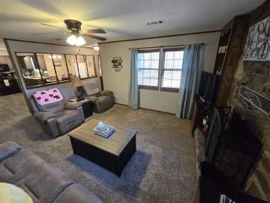 This beautifully updated 2-bedroom, 1.5-bathroom home boasts a on Mountain Ranch Golf Club in Arkansas - for sale on GolfHomes.com, golf home, golf lot