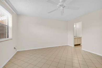 Explore this delightful first-floor unit, boasting two bedrooms on Sunrise Lakes Phase IV Golf Course in Florida - for sale on GolfHomes.com, golf home, golf lot