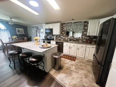 Enjoy a lifestyle of luxury, living in this 2 Bed 2 Bath Palm on Crane Lakes Golf and Country Club in Florida - for sale on GolfHomes.com, golf home, golf lot