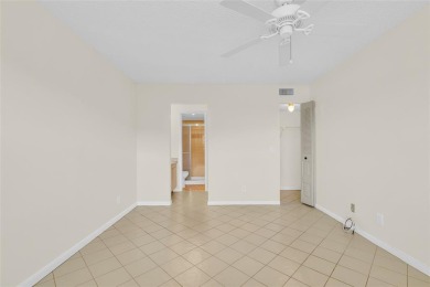 Explore this delightful first-floor unit, boasting two bedrooms on Sunrise Lakes Phase IV Golf Course in Florida - for sale on GolfHomes.com, golf home, golf lot