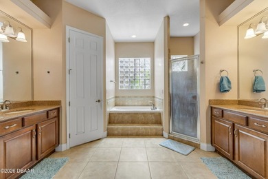 Experience lakeside living in this magnificent lakefront home in on Venetian Bay Golf Course in Florida - for sale on GolfHomes.com, golf home, golf lot