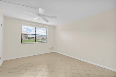 Explore this delightful first-floor unit, boasting two bedrooms on Sunrise Lakes Phase IV Golf Course in Florida - for sale on GolfHomes.com, golf home, golf lot