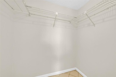 Explore this delightful first-floor unit, boasting two bedrooms on Sunrise Lakes Phase IV Golf Course in Florida - for sale on GolfHomes.com, golf home, golf lot