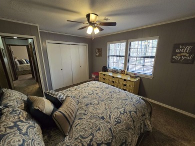 This beautifully updated 2-bedroom, 1.5-bathroom home boasts a on Mountain Ranch Golf Club in Arkansas - for sale on GolfHomes.com, golf home, golf lot