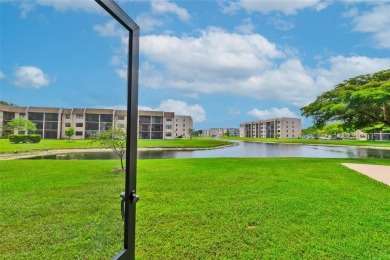 Explore this delightful first-floor unit, boasting two bedrooms on Sunrise Lakes Phase IV Golf Course in Florida - for sale on GolfHomes.com, golf home, golf lot