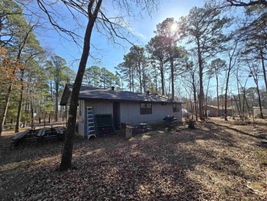 This beautifully updated 2-bedroom, 1.5-bathroom home boasts a on Mountain Ranch Golf Club in Arkansas - for sale on GolfHomes.com, golf home, golf lot