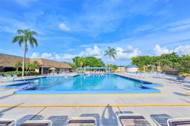 Explore this delightful first-floor unit, boasting two bedrooms on Sunrise Lakes Phase IV Golf Course in Florida - for sale on GolfHomes.com, golf home, golf lot