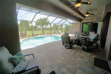 Welcome to Burnt Store Meadows and this amazing 2017 custom on Seminole Lakes Country Club in Florida - for sale on GolfHomes.com, golf home, golf lot