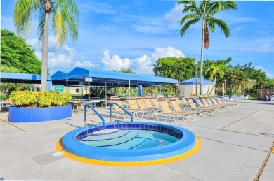 Explore this delightful first-floor unit, boasting two bedrooms on Sunrise Lakes Phase IV Golf Course in Florida - for sale on GolfHomes.com, golf home, golf lot