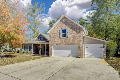 Spacious 5-bed, 3-bath home w/ a 3-car garage on over an acre in on Lost Plantation Golf Club in Georgia - for sale on GolfHomes.com, golf home, golf lot
