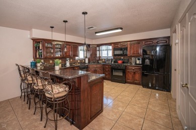 Welcome to your dream home! This spacious 2,451 sq. ft on Cocopah Rio Colorado Golf Course in Arizona - for sale on GolfHomes.com, golf home, golf lot