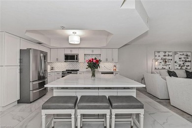 Step into this stunning newly renovated condo with sweeping on Bonita Bay West in Florida - for sale on GolfHomes.com, golf home, golf lot