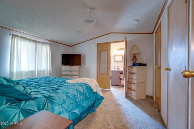 Welcome home to lively resort-style living at La Casa Blanca, a on Apache Creek Golf Club in Arizona - for sale on GolfHomes.com, golf home, golf lot