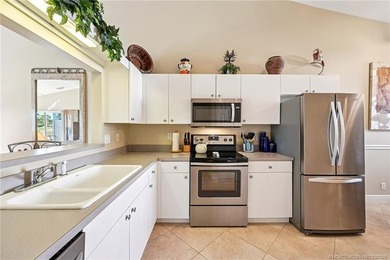 GOLF COURSE VIEWS & NEW METAL ROOF - TURNKEY OPPORTUNITY! on Eagle Marsh Golf Club in Florida - for sale on GolfHomes.com, golf home, golf lot