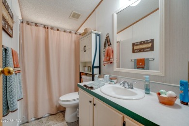 Welcome home to lively resort-style living at La Casa Blanca, a on Apache Creek Golf Club in Arizona - for sale on GolfHomes.com, golf home, golf lot