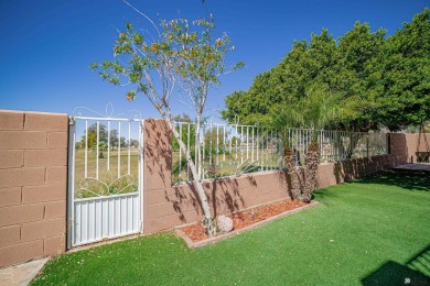 Welcome to your dream home! This spacious 2,451 sq. ft on Cocopah Rio Colorado Golf Course in Arizona - for sale on GolfHomes.com, golf home, golf lot