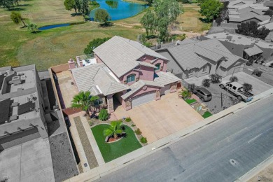 Welcome to your dream home! This spacious 2,451 sq. ft on Cocopah Rio Colorado Golf Course in Arizona - for sale on GolfHomes.com, golf home, golf lot