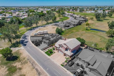 Welcome to your dream home! This spacious 2,451 sq. ft on Cocopah Rio Colorado Golf Course in Arizona - for sale on GolfHomes.com, golf home, golf lot