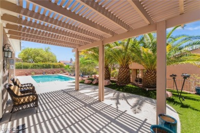 Stunning single story in the highly sought after guard gated on Siena Golf Club in Nevada - for sale on GolfHomes.com, golf home, golf lot