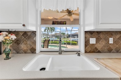 Welcome to Punta Gorda Isles--this meticulously maintained on Saint Andrews South Golf Club in Florida - for sale on GolfHomes.com, golf home, golf lot