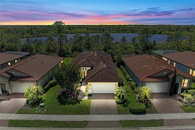 Experience tranquil Florida living in this stunning WCI-built on Sarasota National Golf Club in Florida - for sale on GolfHomes.com, golf home, golf lot