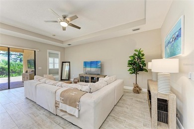 Experience tranquil Florida living in this stunning WCI-built on Sarasota National Golf Club in Florida - for sale on GolfHomes.com, golf home, golf lot