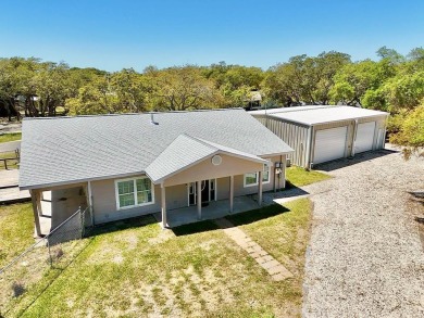 This is a Charming Coastal Retreat with detached barn nestled on Lamar Golf Course in Texas - for sale on GolfHomes.com, golf home, golf lot