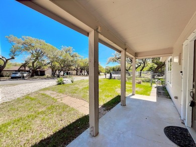 This is a Charming Coastal Retreat with detached barn nestled on Lamar Golf Course in Texas - for sale on GolfHomes.com, golf home, golf lot