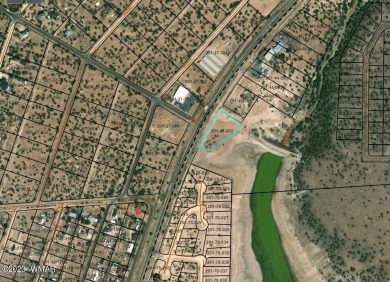 1.24 acre lot directly across from Family Dollar in Concho on Concho Valley Country Club in Arizona - for sale on GolfHomes.com, golf home, golf lot