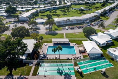 Gorgeous Pompano Beach Private Golf Community Corner Unit condo on Leisureville Community Association in Florida - for sale on GolfHomes.com, golf home, golf lot