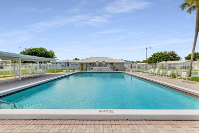 Gorgeous Pompano Beach Private Golf Community Corner Unit condo on Leisureville Community Association in Florida - for sale on GolfHomes.com, golf home, golf lot