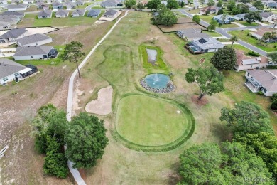 FORE!!! Heads up because this lovely recently updated Laurel on Twisted Oaks Golf Club in Florida - for sale on GolfHomes.com, golf home, golf lot