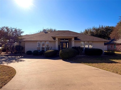 Charming Corner Lot Retreat Near Nutcracker Golf Course!This on Pecan Plantation Country Club in Texas - for sale on GolfHomes.com, golf home, golf lot