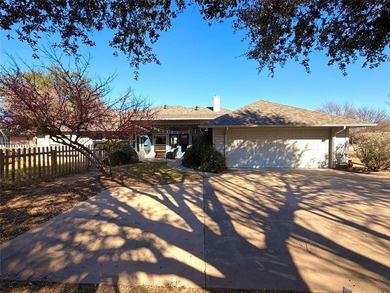 Charming Corner Lot Retreat Near Nutcracker Golf Course!This on Pecan Plantation Country Club in Texas - for sale on GolfHomes.com, golf home, golf lot
