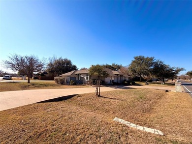 Charming Corner Lot Retreat Near Nutcracker Golf Course!This on Pecan Plantation Country Club in Texas - for sale on GolfHomes.com, golf home, golf lot