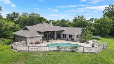 Beautiful lakefront home on 1.25 in the gated community of on Harbour Ridge Yacht and Country Club in Florida - for sale on GolfHomes.com, golf home, golf lot