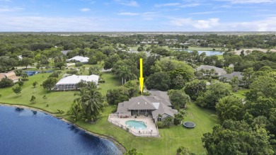 Beautiful lakefront home on 1.25 in the gated community of on Harbour Ridge Yacht and Country Club in Florida - for sale on GolfHomes.com, golf home, golf lot