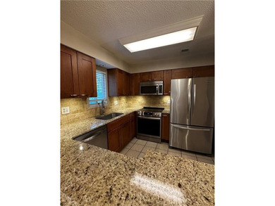 Beautifully Updated Mission Lake Townhome Backing to Scenic on Minor Park Golf Course in Missouri - for sale on GolfHomes.com, golf home, golf lot