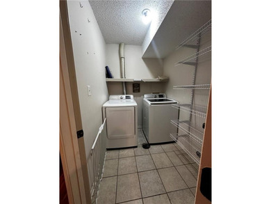 Beautifully Updated Mission Lake Townhome Backing to Scenic on Minor Park Golf Course in Missouri - for sale on GolfHomes.com, golf home, golf lot