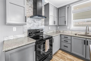 WATERFRONT LIVING | Fully Furnished | 2021 Palm Harbor Home
 on Mangrove Bay Golf Course in Florida - for sale on GolfHomes.com, golf home, golf lot
