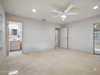 Tucked away in Fairgreen Estates on a manicured landscaped on New Smyrna Beach Golf Course in Florida - for sale on GolfHomes.com, golf home, golf lot