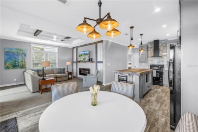 WATERFRONT LIVING | Fully Furnished | 2021 Palm Harbor Home
 on Mangrove Bay Golf Course in Florida - for sale on GolfHomes.com, golf home, golf lot
