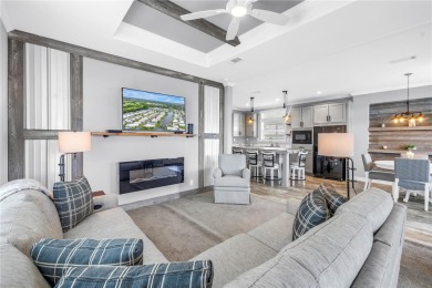 WATERFRONT LIVING | Fully Furnished | 2021 Palm Harbor Home
 on Mangrove Bay Golf Course in Florida - for sale on GolfHomes.com, golf home, golf lot