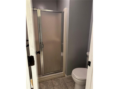 Beautifully Updated Mission Lake Townhome Backing to Scenic on Minor Park Golf Course in Missouri - for sale on GolfHomes.com, golf home, golf lot